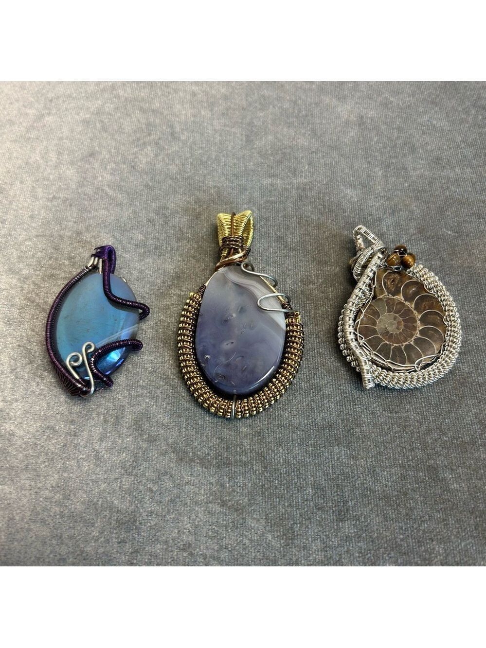 handmade wire-wrapped gemstone pendants blue agate purple agate ammonite fossil